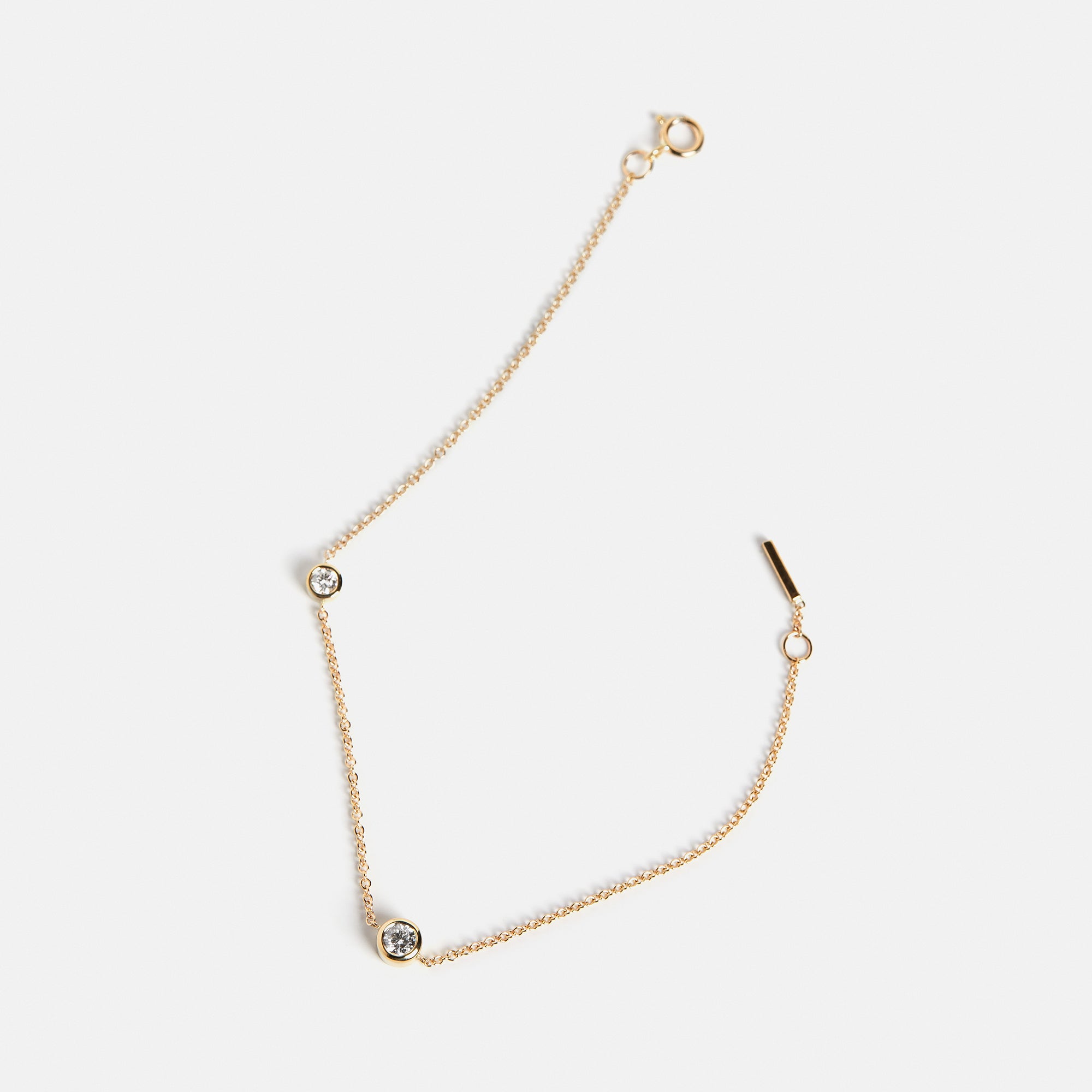 Designer bracelet with dainty chain and lab grown white diamonds in solid 14k or 18k gold by SHW best fine jewelry store in downtown NYC