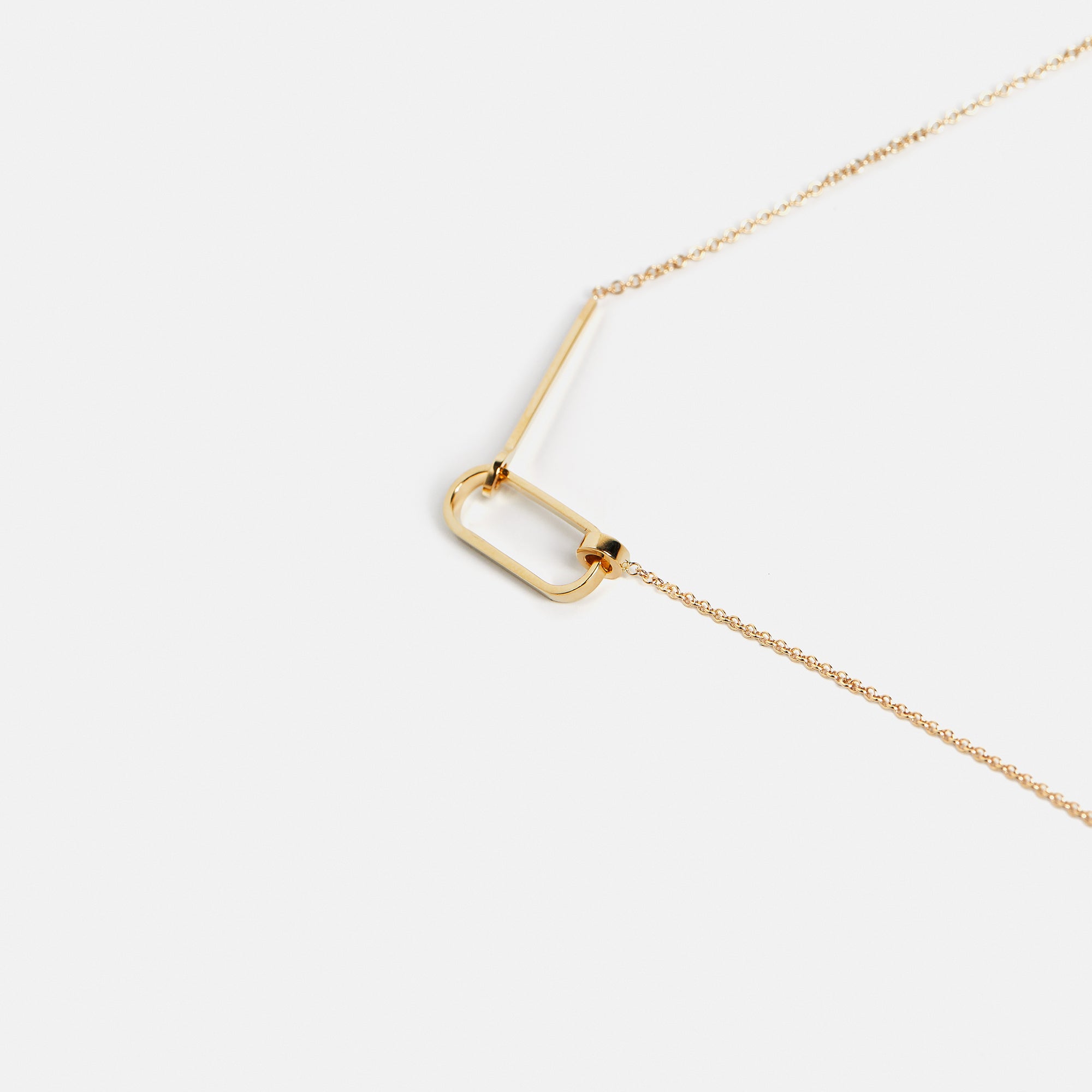 Minimalist Necklace with delicate chain and moveable pendant design in 14k or 18k gold by SHW best fine jewelry store in downtown NYC near me