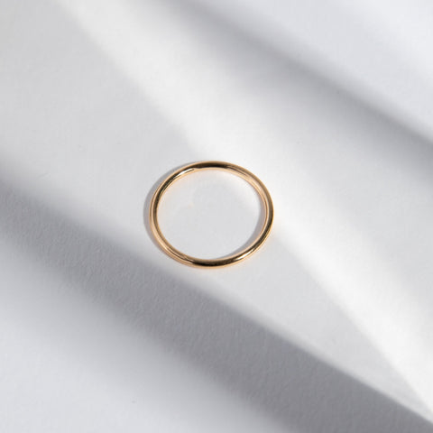 Minimalist Stackable Round Wedding Band with Custom Engraving in Solid 14k yellow gold by SHW coolest fine jewelry store in NYC NJ