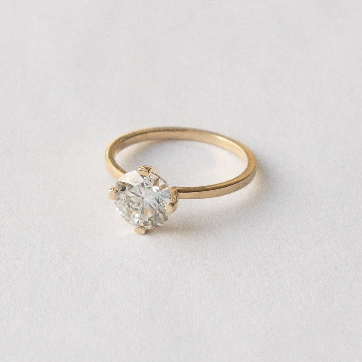 Cool Compass Prongs Engagement Ring with 1.5 ct laboratory made diamond in 14k yellow gold by SHW best fine jewelry stores in downtown NYC