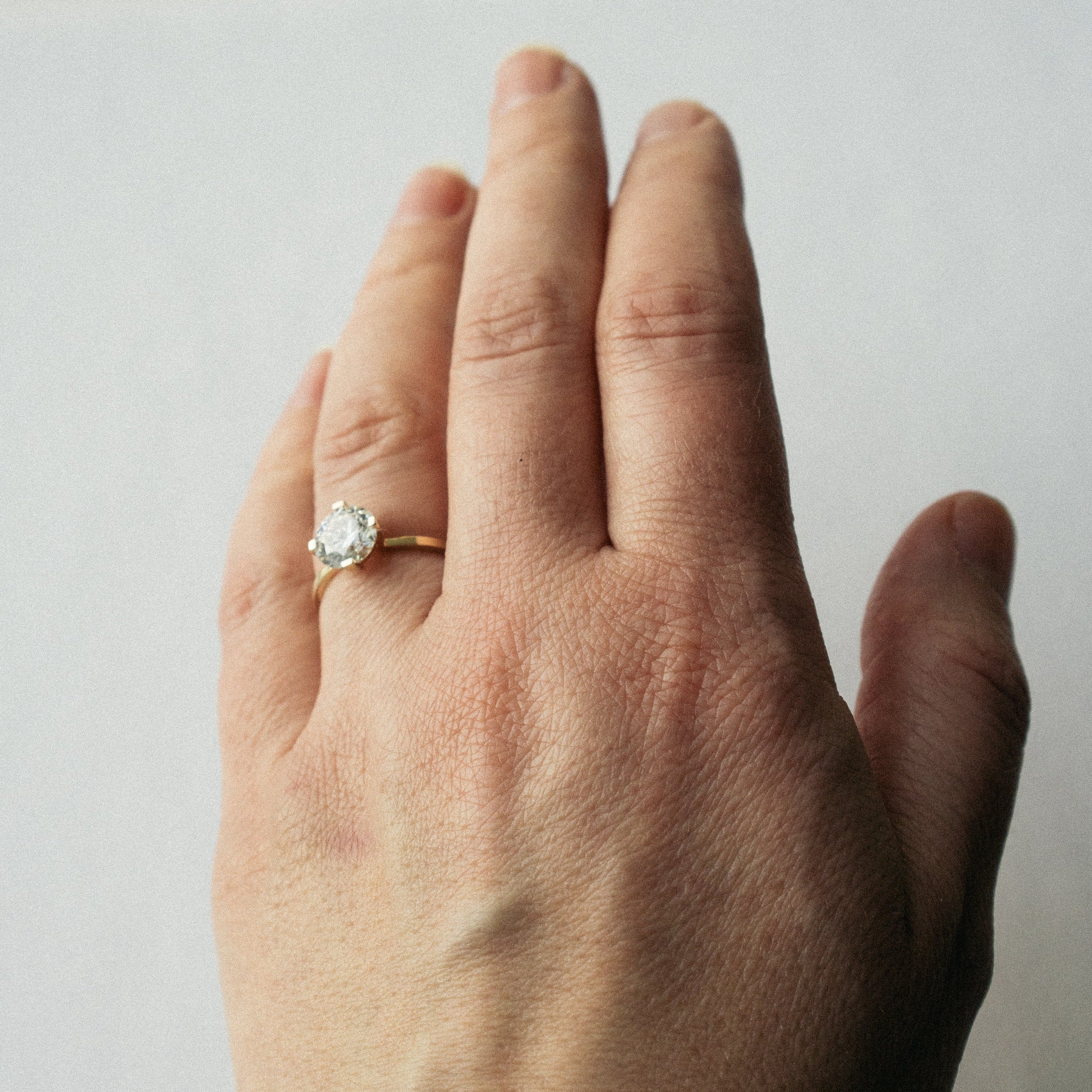Modern Thinner Stackable Band Engagement Ring with 1.5ct man made diamond in 14k yellow gold by SHW best fine jewelry store in East Village