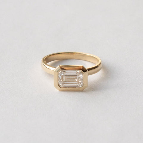 Unique Bezel Engagement Ring 1.0ct emerald-cut lab grown diamond in 14k yellow gold by SHW best fine jewelry stores in downtown NYC nearby