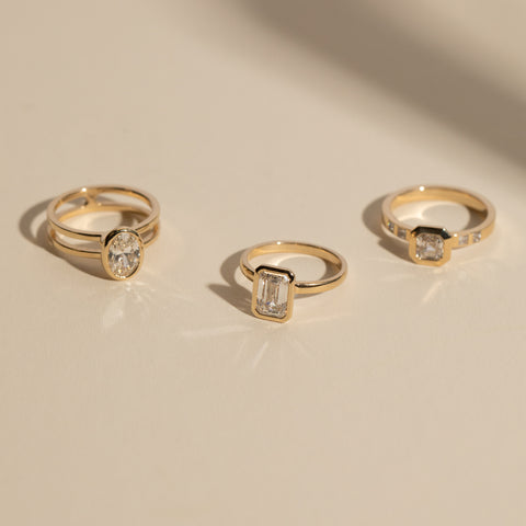 Minimalist Domed Band Engagement Ring with 1.50ct lab-grown emerald cut diamond in 14 karat yellow gold by SHW fine jewelry store in NYC NJ