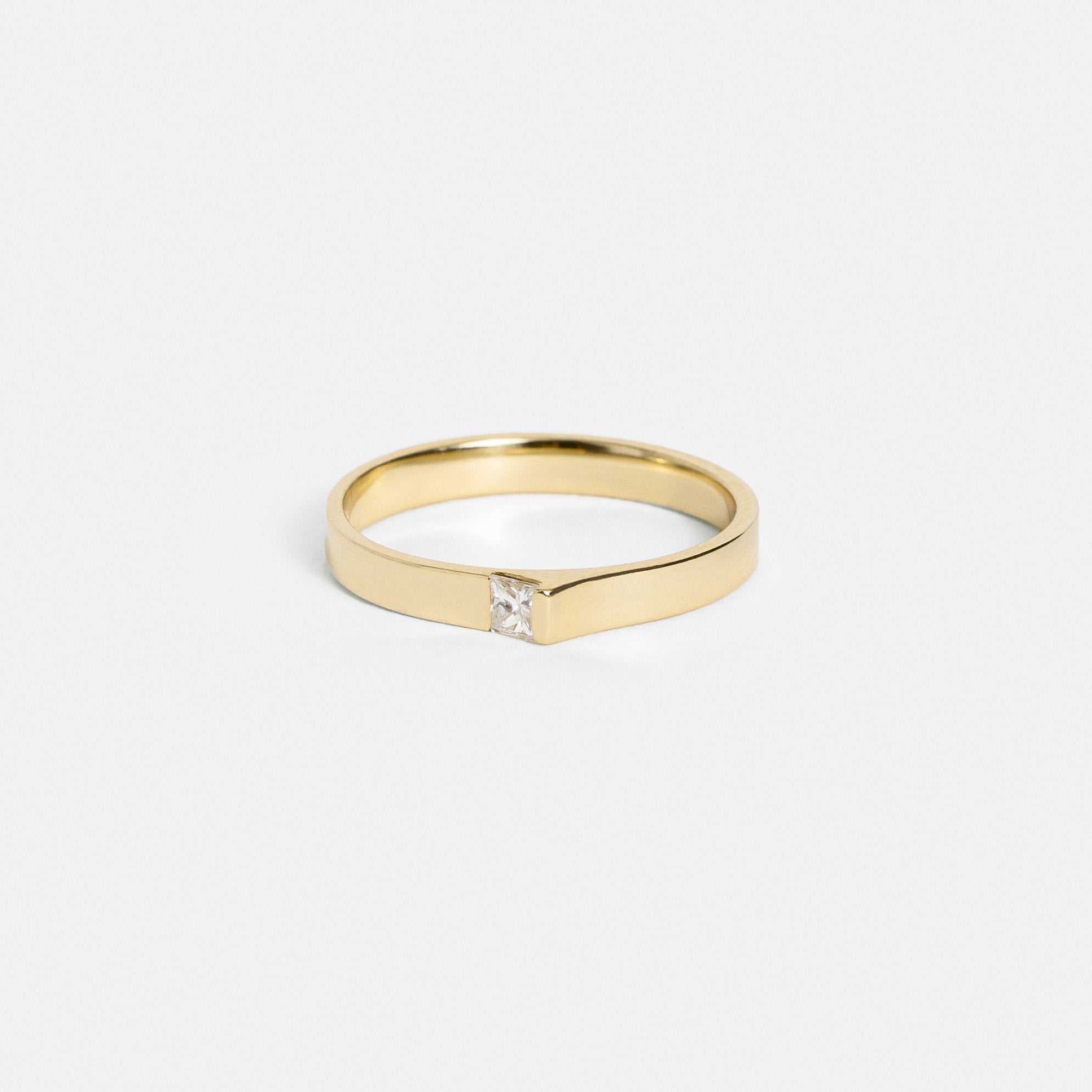 14k yellow gold 2.5mm flat band with princess-cut white diamond