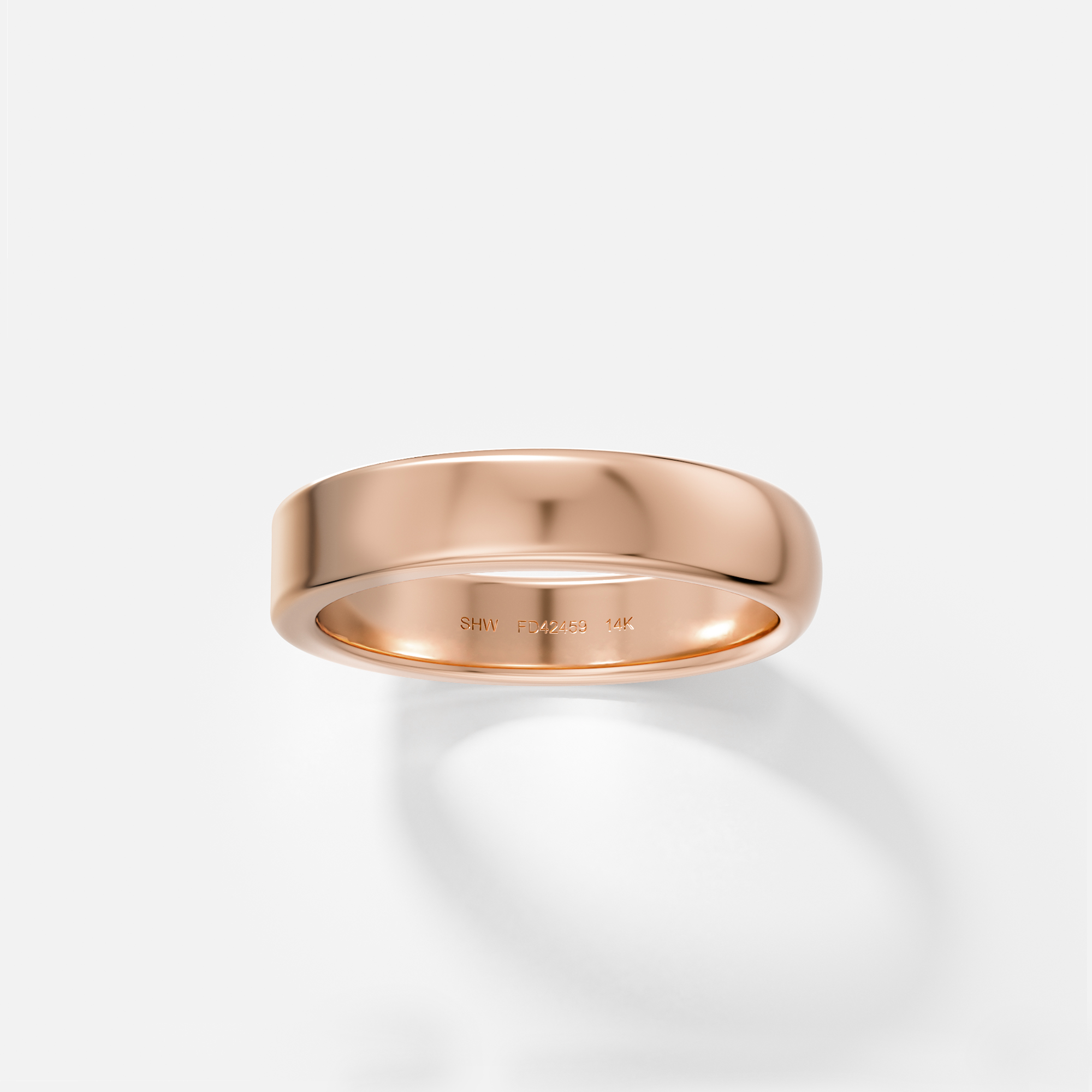 14k rose gold band combining flat plane and curved surface