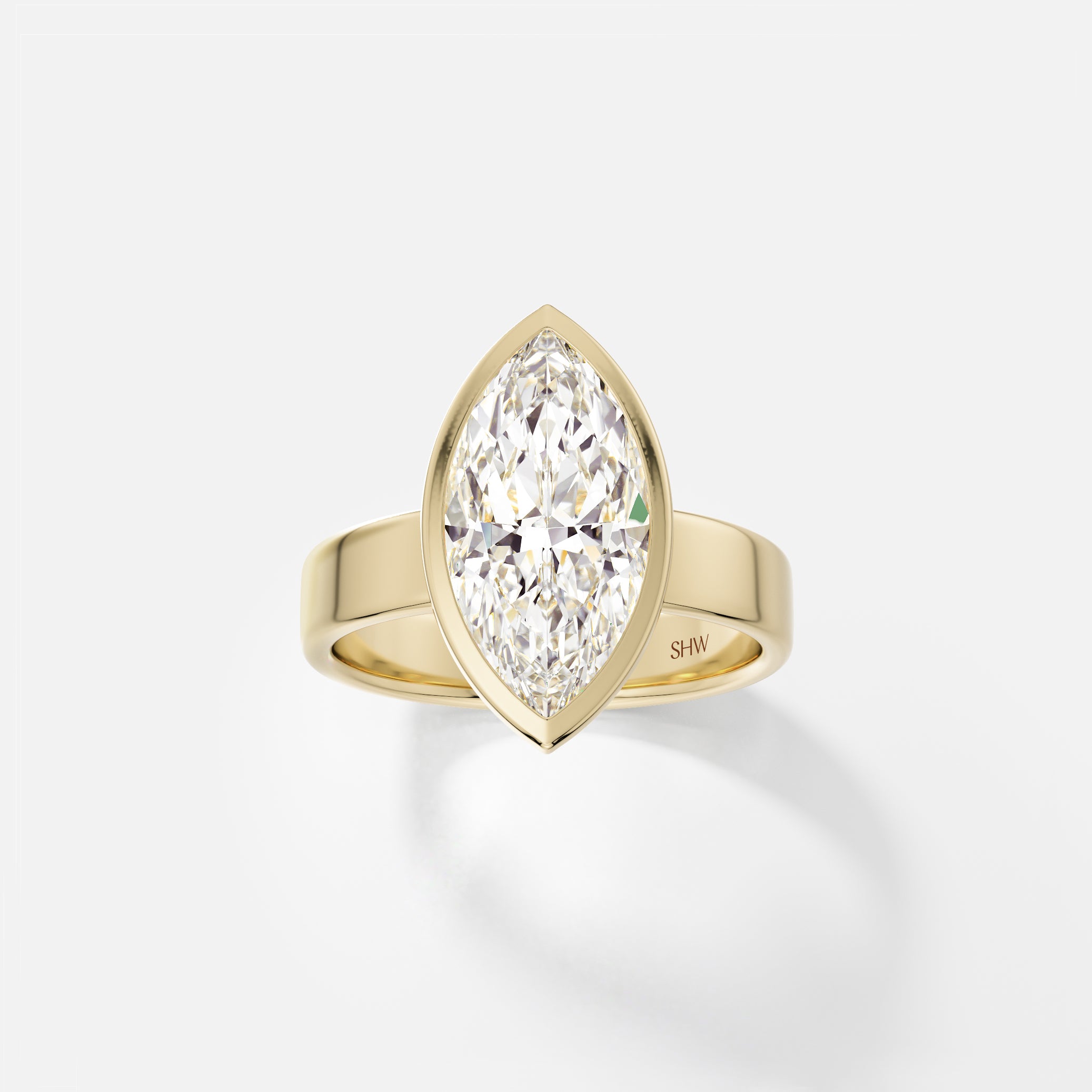 14k yellow gold wide flat band engagement ring with 3 carat marquise diamond set north south in thin bezel