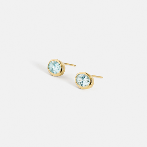 Oval aquamarine stud earrings east west set March birthstone 14k 18k yellow white rose gold SHW fine jewelry handmade in NYC