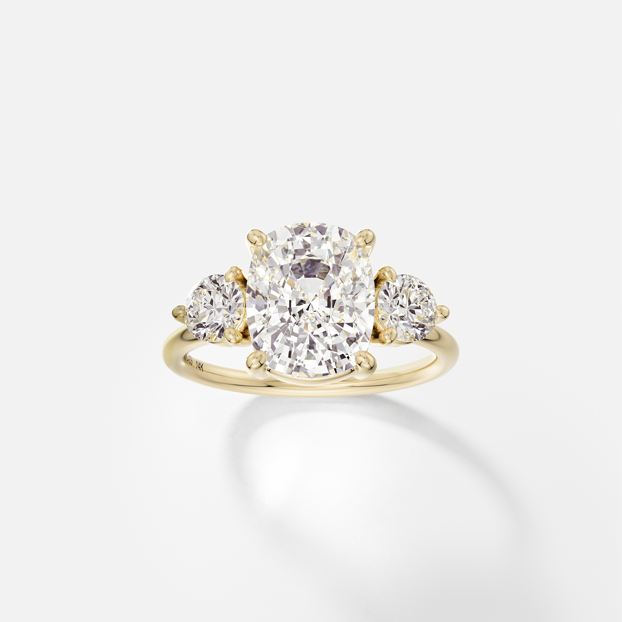 North South elongated cushion engagement ring with round side diamonds three stone cluster 14k 18k gold platinum SHW Fine Jewelry NYC