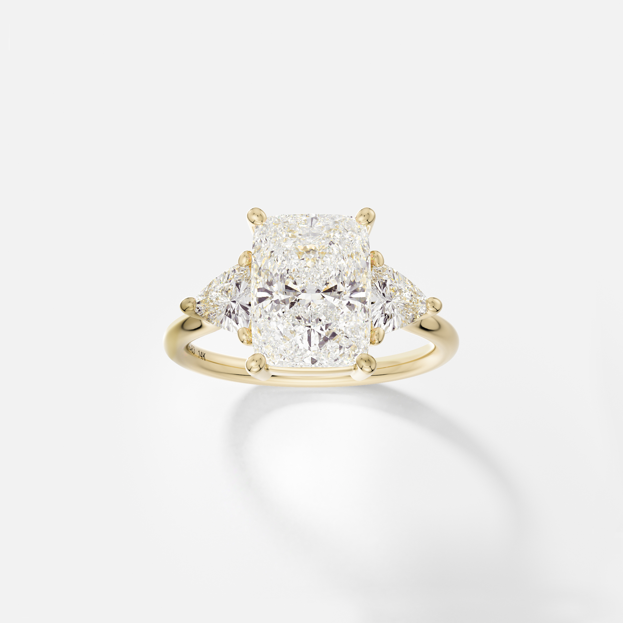 North South elongated cushion cut engagement ring with trillion side diamonds three stone cluster 14k 18k gold platinum SHW Fine Jewelry NYC
