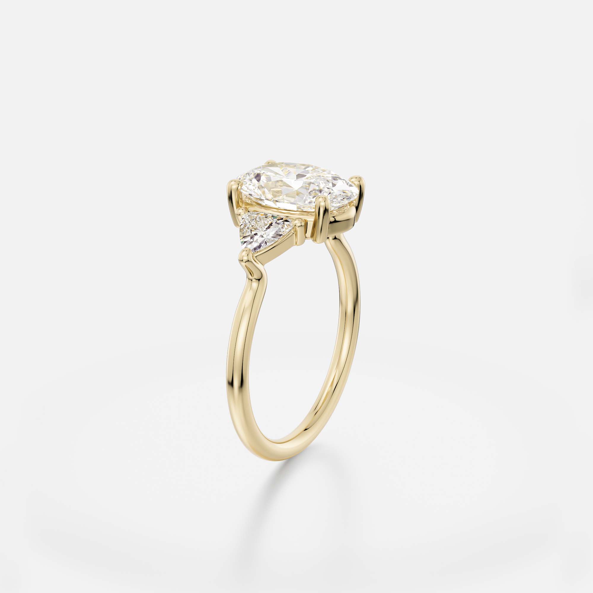 Three stone oval cut ring with trillion diamond accents 14k 18k gold platinum SHW fine jewelry NYC