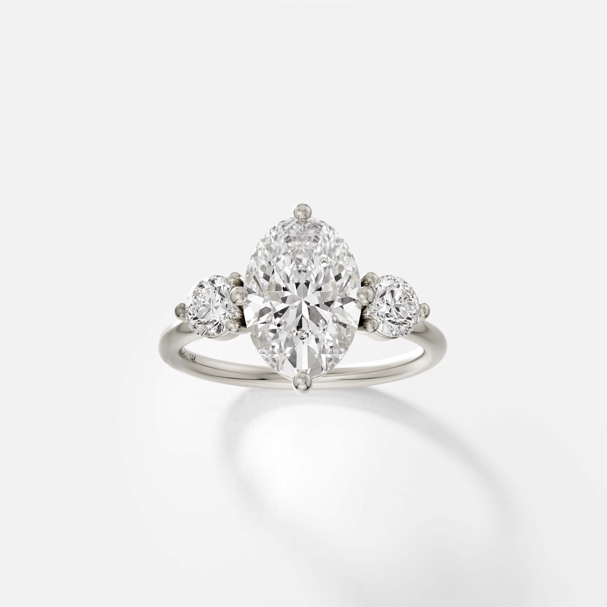 Kele oval diamond three stone engagement ring front view in 14k white gold