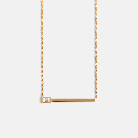 Unique necklace with dainty chain and bar pendant with baguette cut lab grown white diamond in solid 14k gold by SHW cool fine jewelry NYC