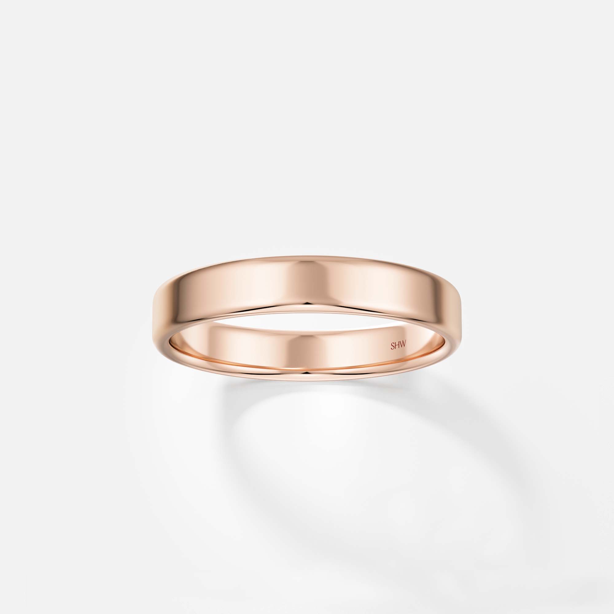 Traditional 4mm wide wedding band for men and women with softened edge and flat profile in 14k, 18k gold or platinum by SHW fine jewelry NYC