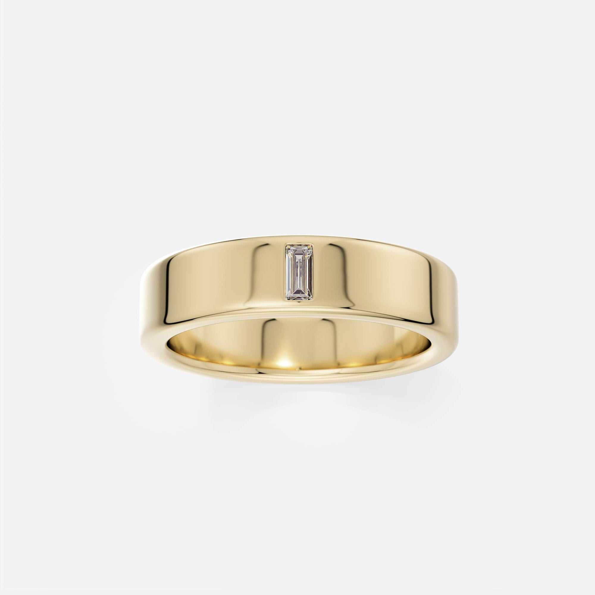 14k yellow gold flat wedding band with a single baguette-cut diamond