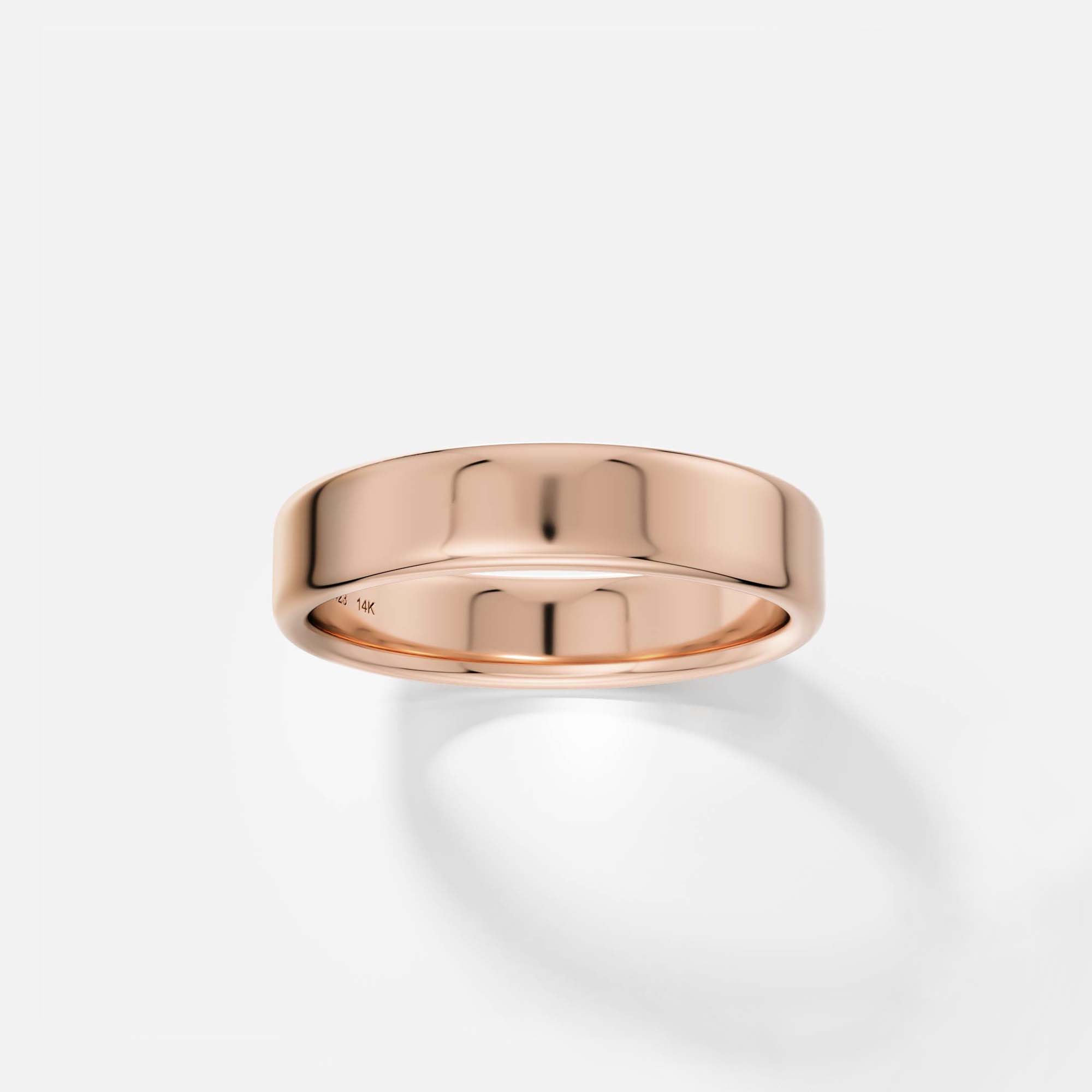 Traditional 5mm wide wedding band for men and women with softened edge and flat profile in 14k, 18k gold or platinum by SHW fine jewelry NYC