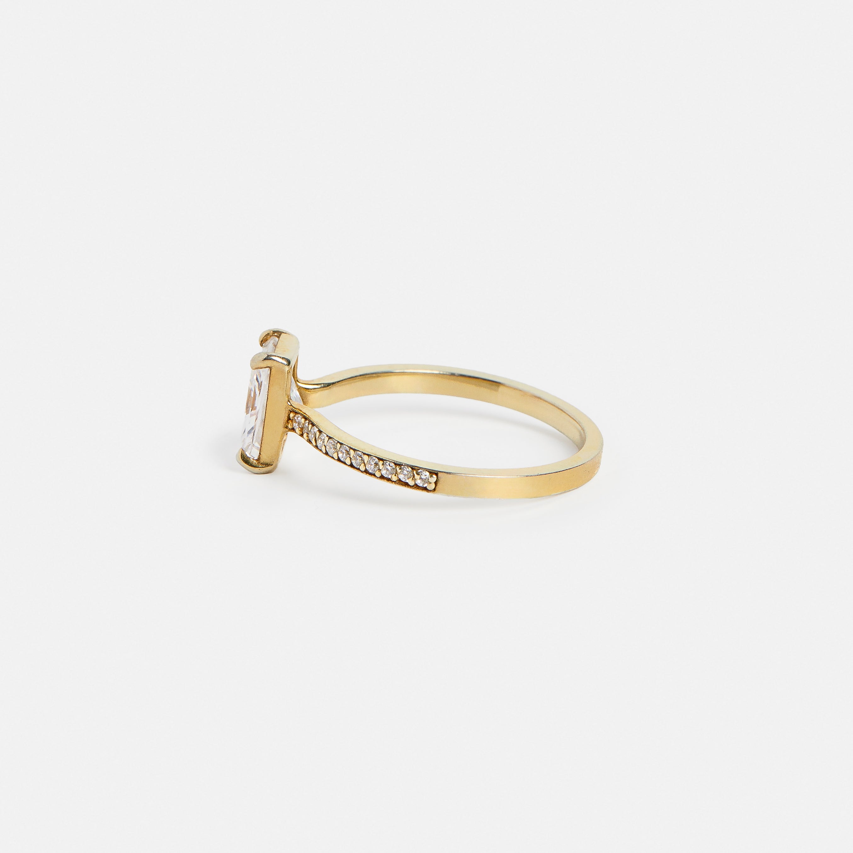 1.25 carat radiant-cut diamond engagement ring with corner prongs and pavé diamond half eternity band on slim gold band