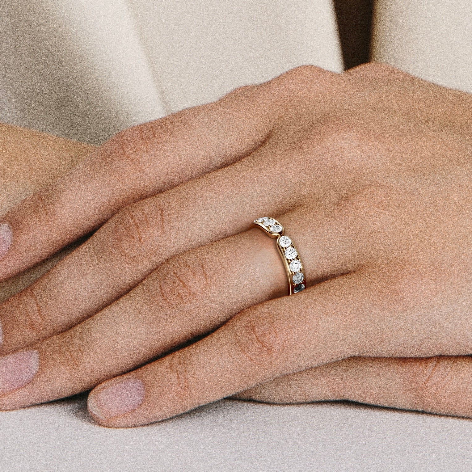 Minimal pavé diamond wedding band shown worn in natural light