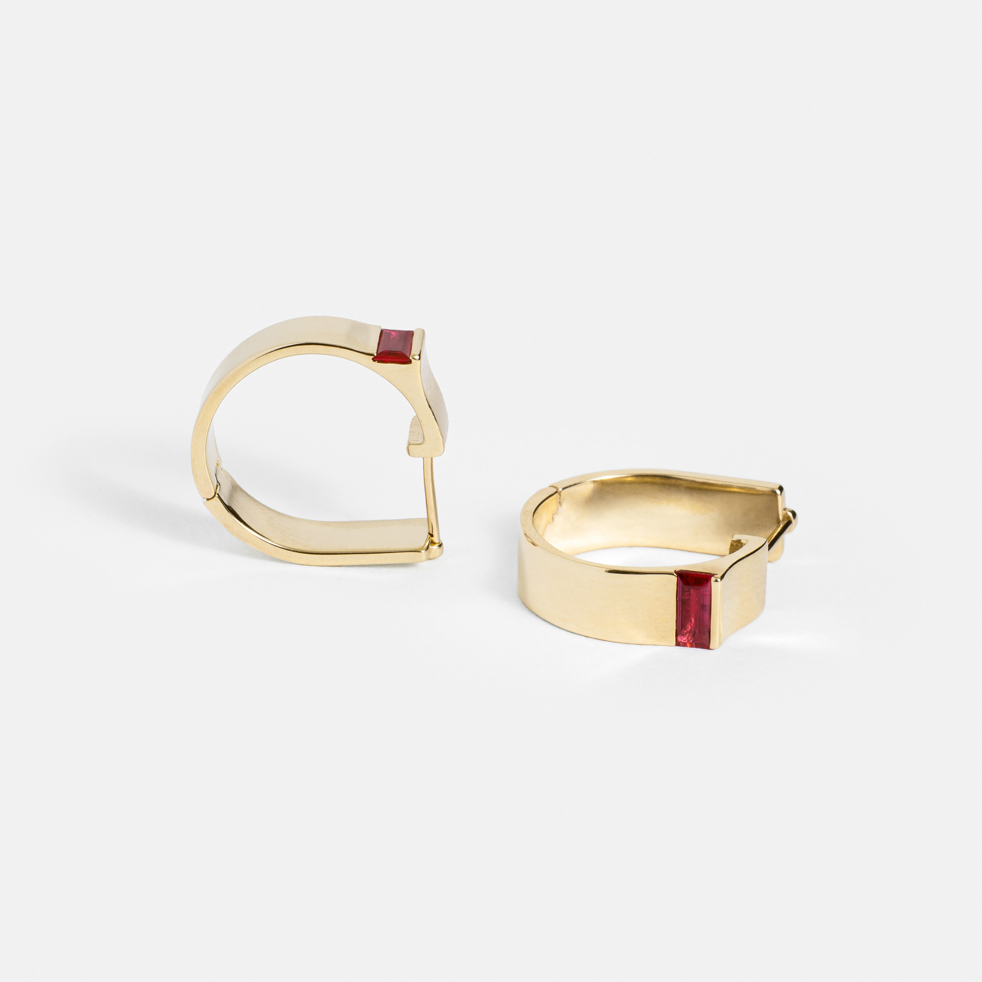 Cool hinged hoop earring with baguette red ruby gemstones in 14 karat yellow, white, rose gold by SHW cool fine jewelry stores in NYC