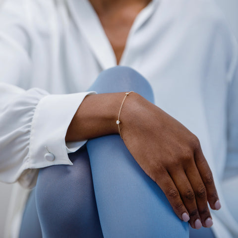 Modern bracelet with delicate chain and asymmetrical lab created white diamonds in 14 karat gold by SHW best fine jewelry store in NYC