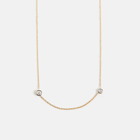 Unique necklace with dainty chain and asymmetrical lab grown white diamonds in solid 14k gold by SHW cool fine jewelry stores in NYC nearby