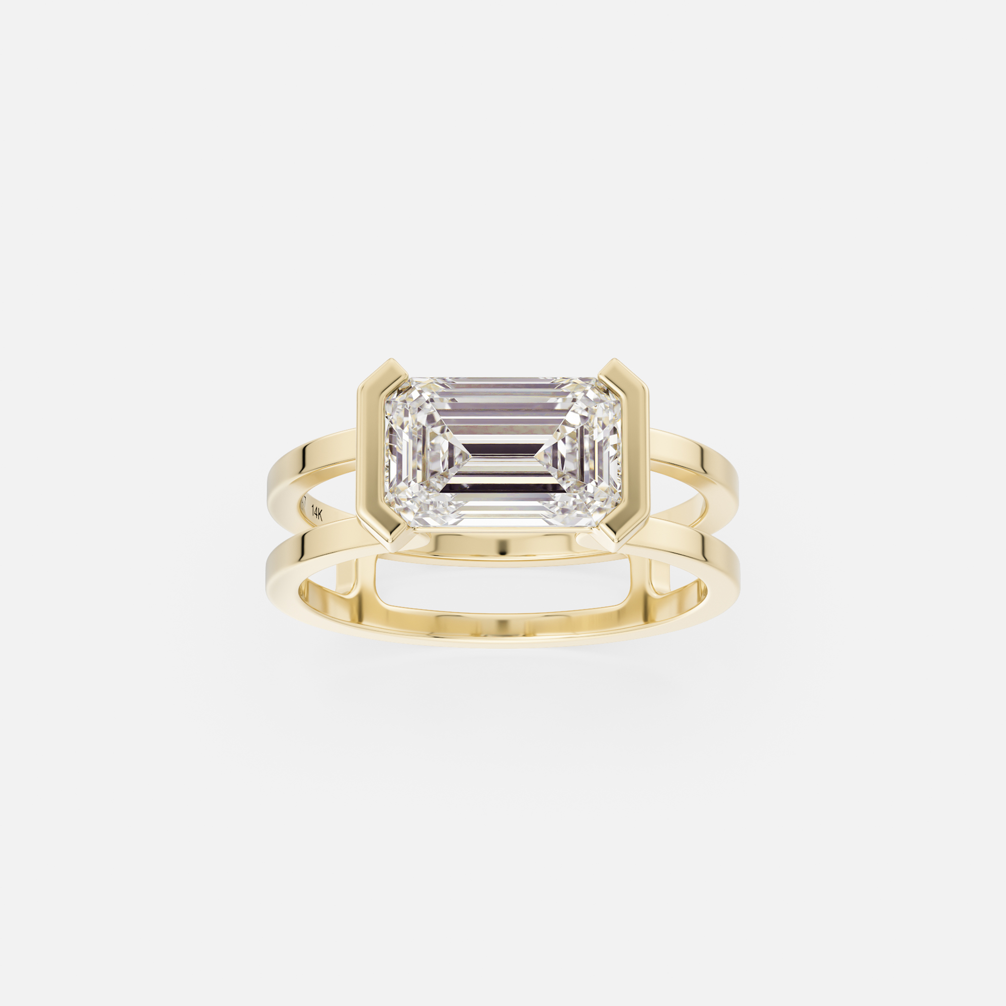 14k yellow gold 1.75 carat east-west emerald-cut diamond engagement ring with double band and tapering partial bezel