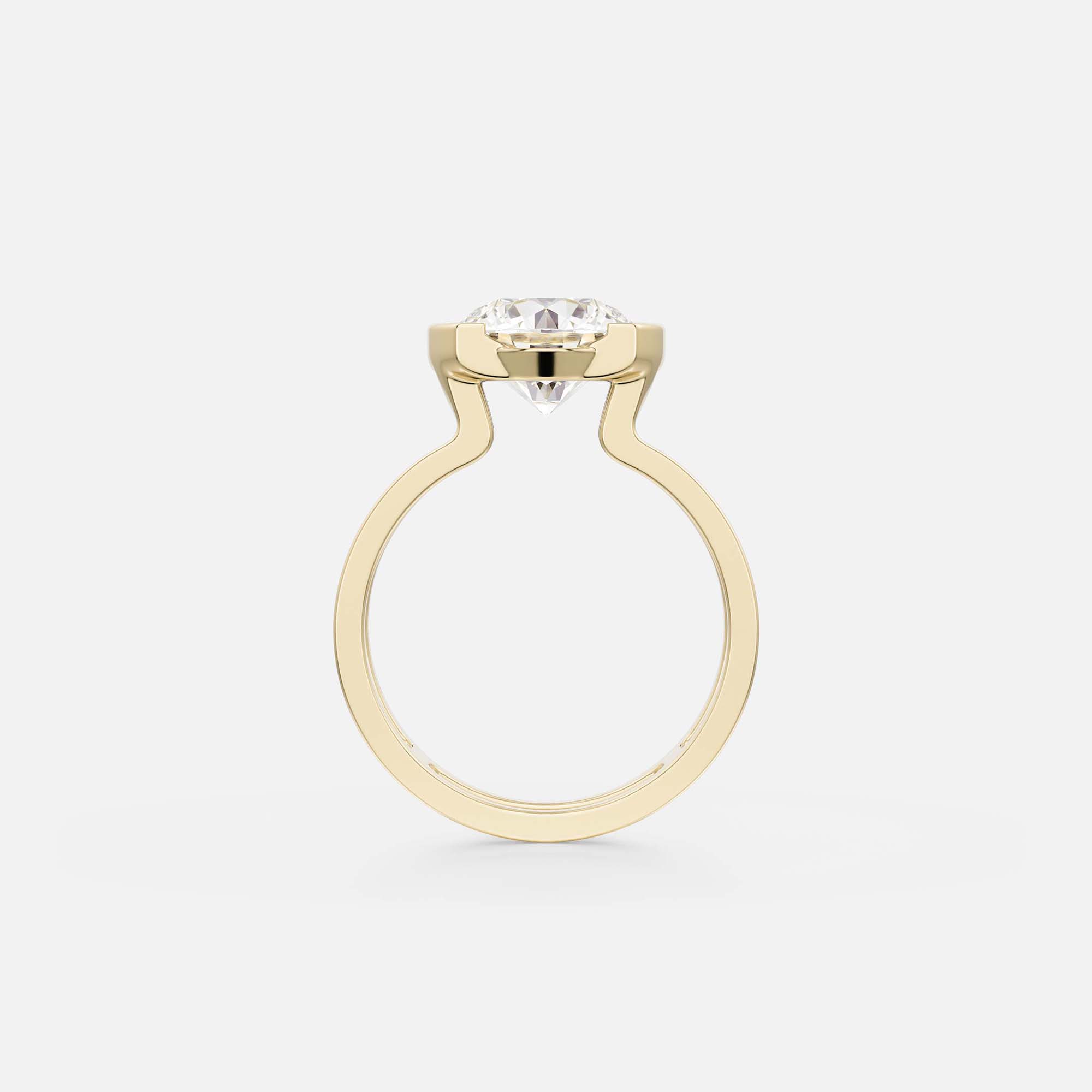 side profile of round diamond engagement ring with double band and partial bezel exposing diamond sides