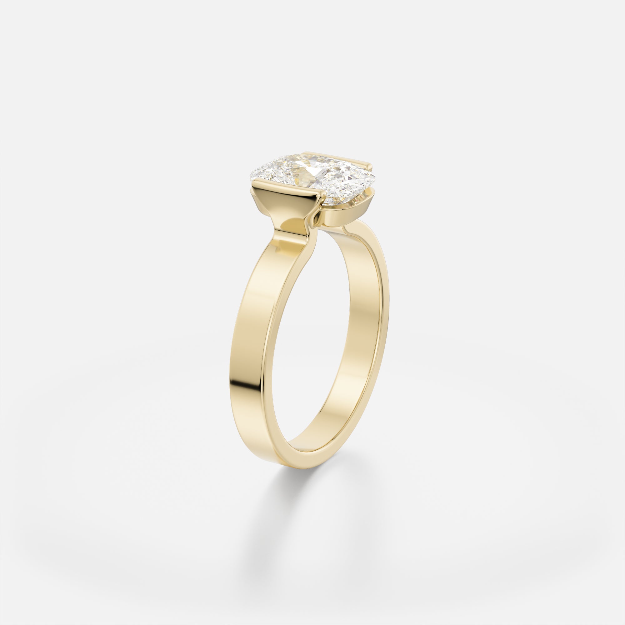 Silvi cushion diamond tapering partial bezel engagement ring angled side view