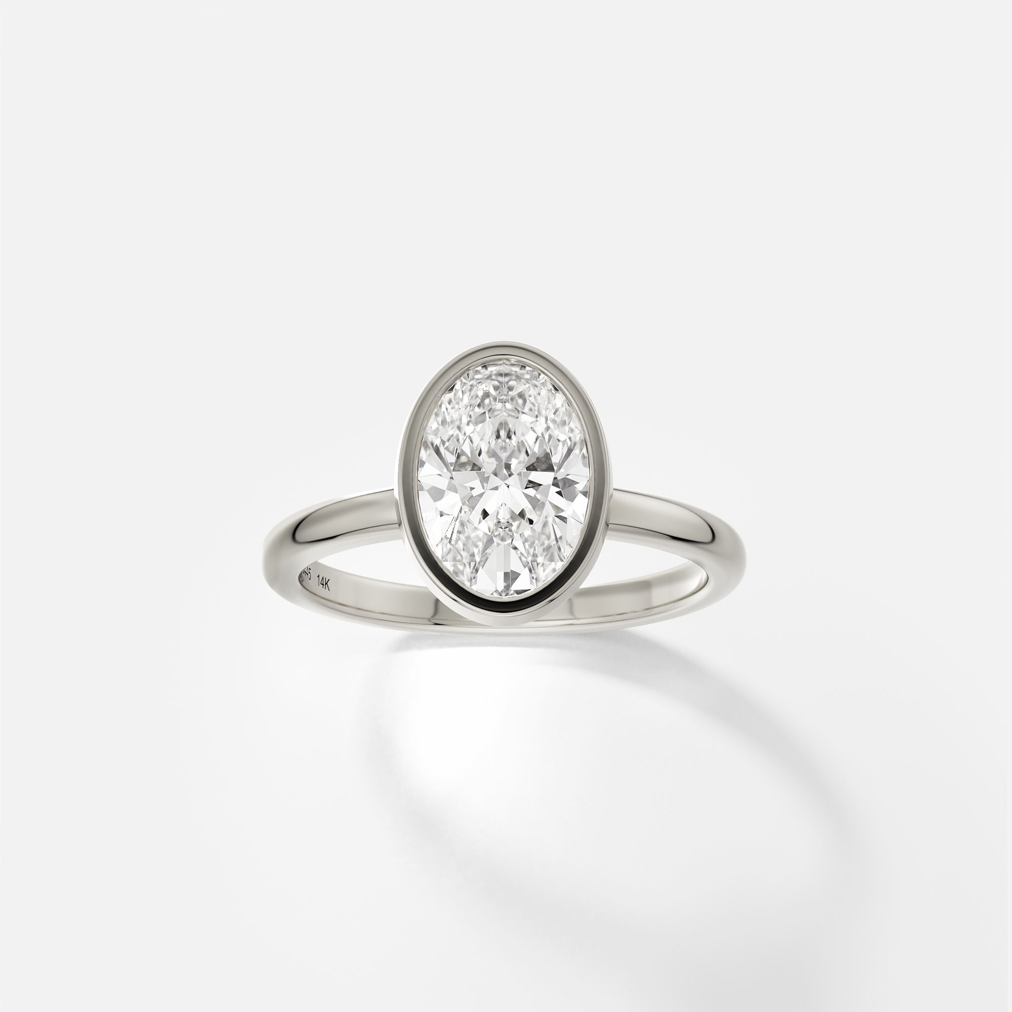 Syd oval diamond bezel engagement ring front view in 14k white gold