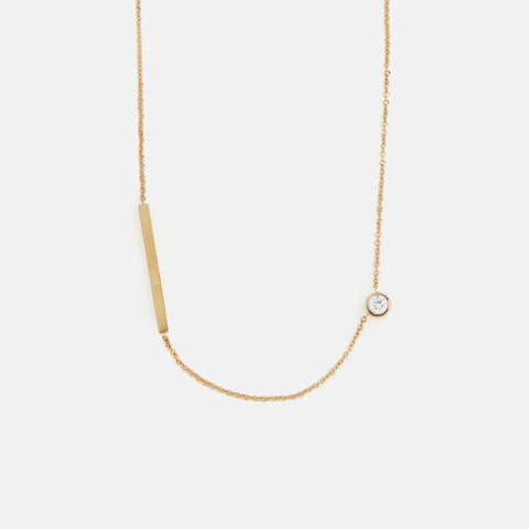 Unique necklace with dainty chain and asymmetrical lab grown white diamond in solid 14k gold by SHW cool fine jewelry store in NYC nearby