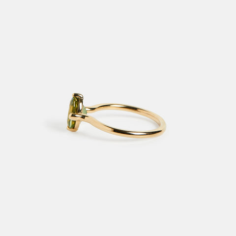 Unique dainty engagement ring with north south oval green tourmaline gemstone in a delicate 14 karat gold setting by SHW fine jewelry NYC