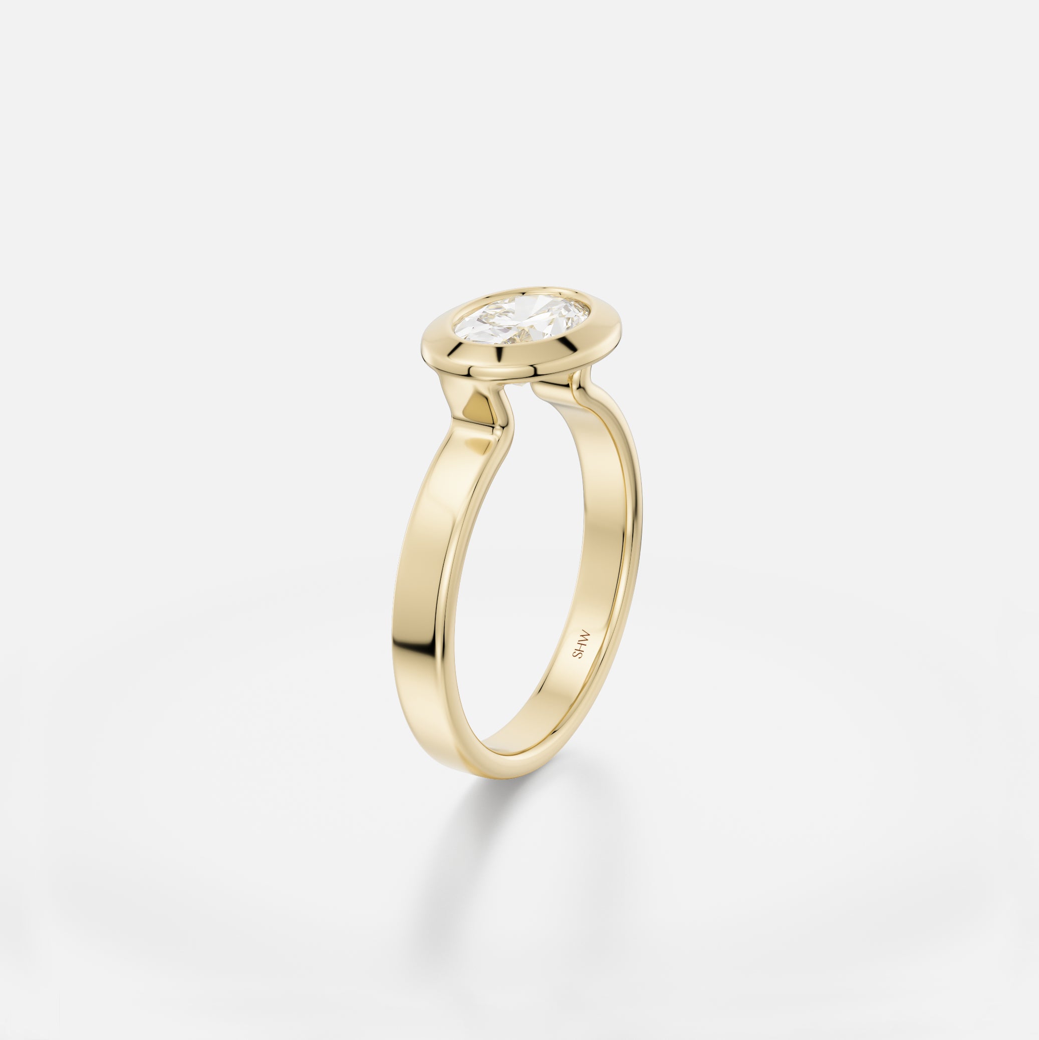 Modern wide band engagement ring with 1 ct oval diamond set east west in sculptural bezel