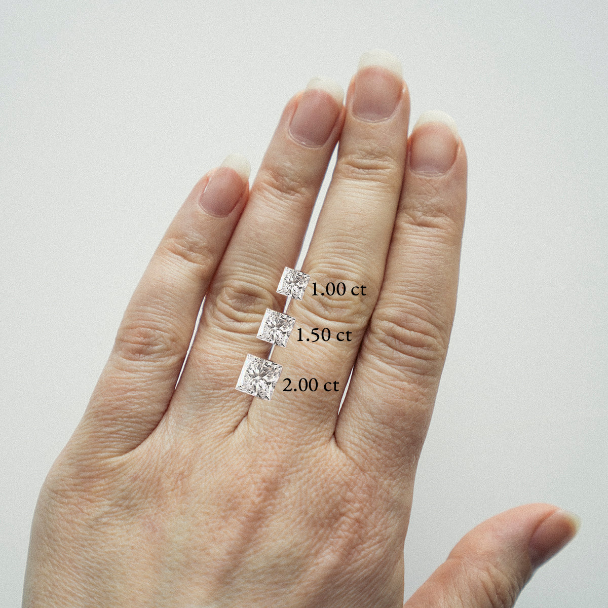 Aida Unique Ring in 14k Gold set with a square cut lab-grown diamond and two baguette cute lab-grown diamonds By SHW Fine Jewelry NYC
