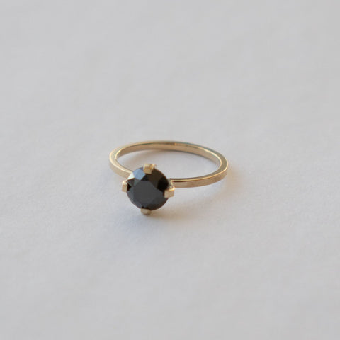 Vila Solitaire Ring in 14k gold set with a 1.65ct round brilliant cut black diamond by SHW Fine Jewelry NYC