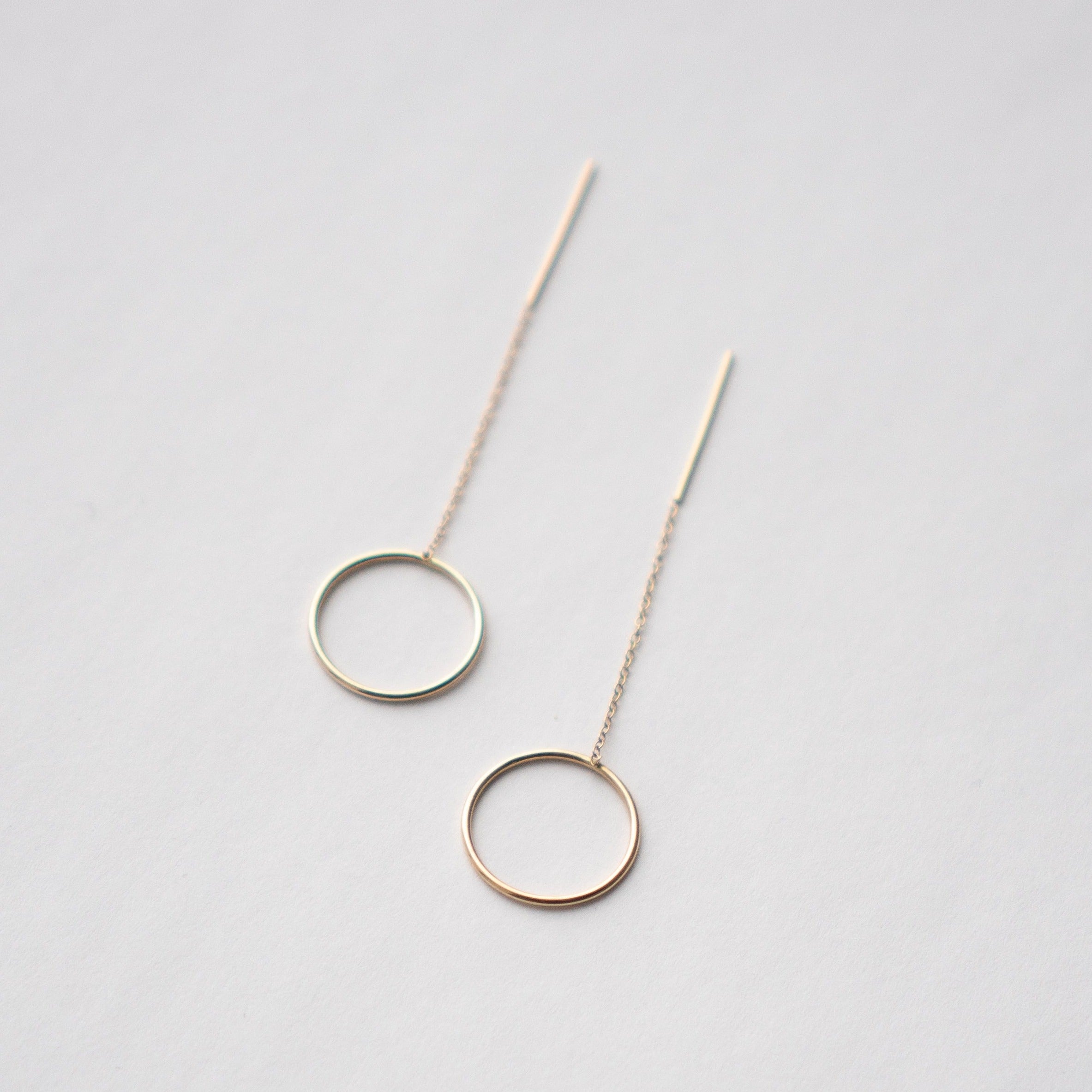 Minimal Lili Pull-Through Circle earrings in 14k yellow gold by SHW Fine Jewelry in NYC