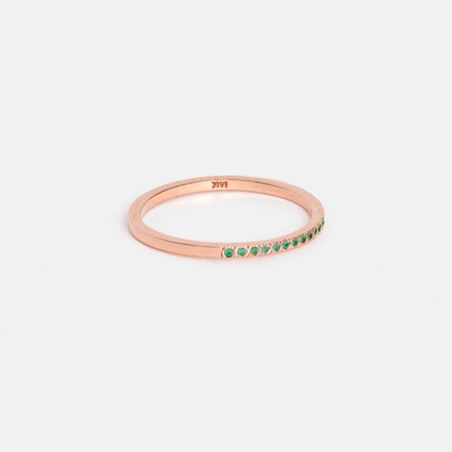 14k rose gold thin half eternity band with pavé emeralds