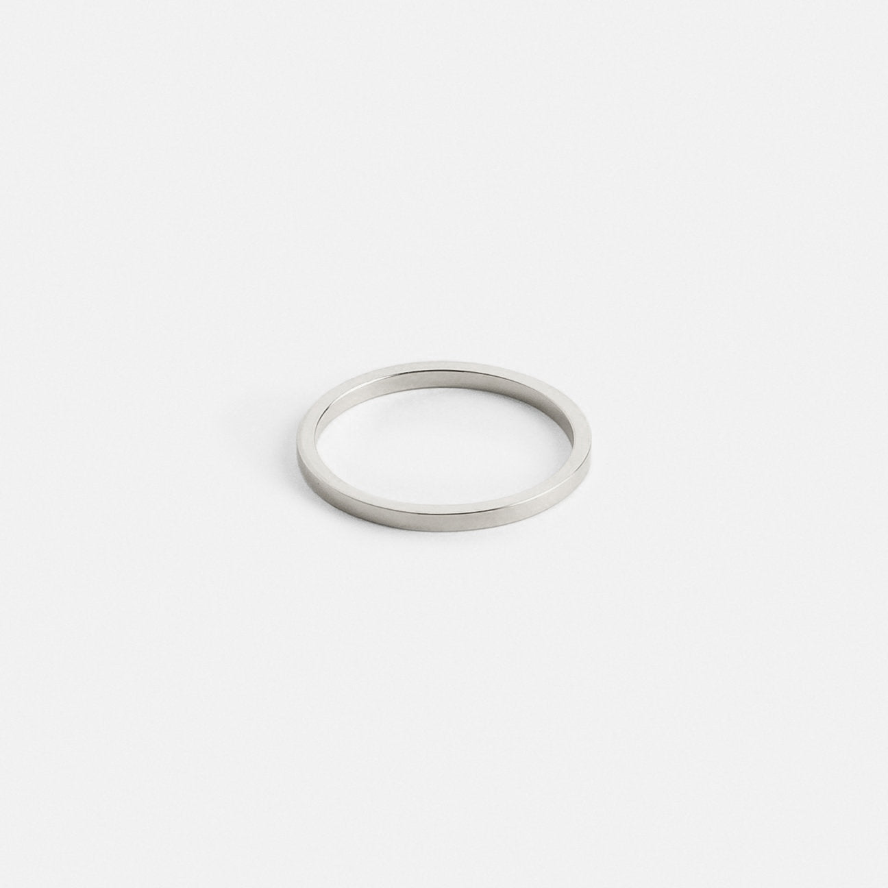 14k white gold flat profile wedding band with simple design