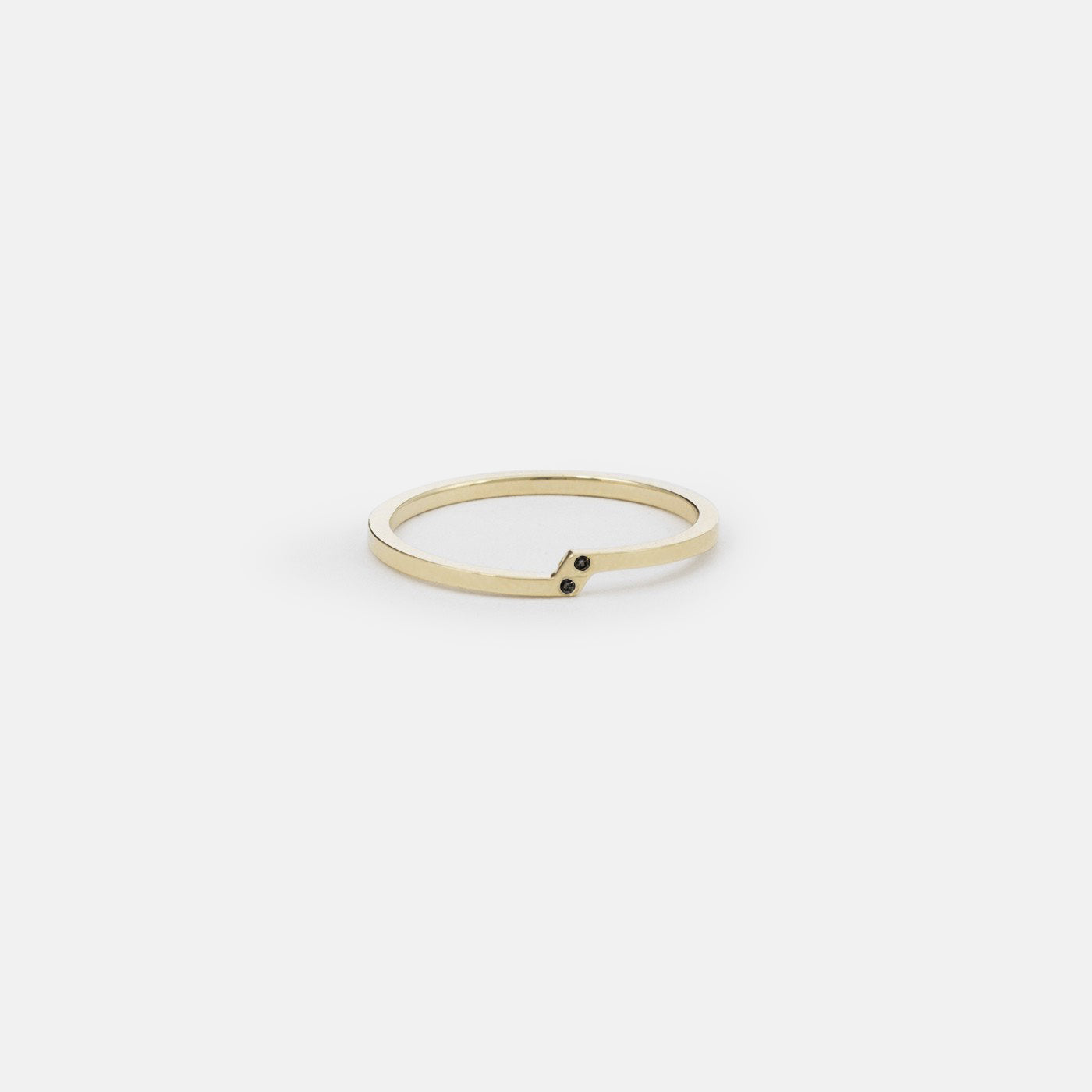 14k yellow gold thin offset band ring with two black diamonds