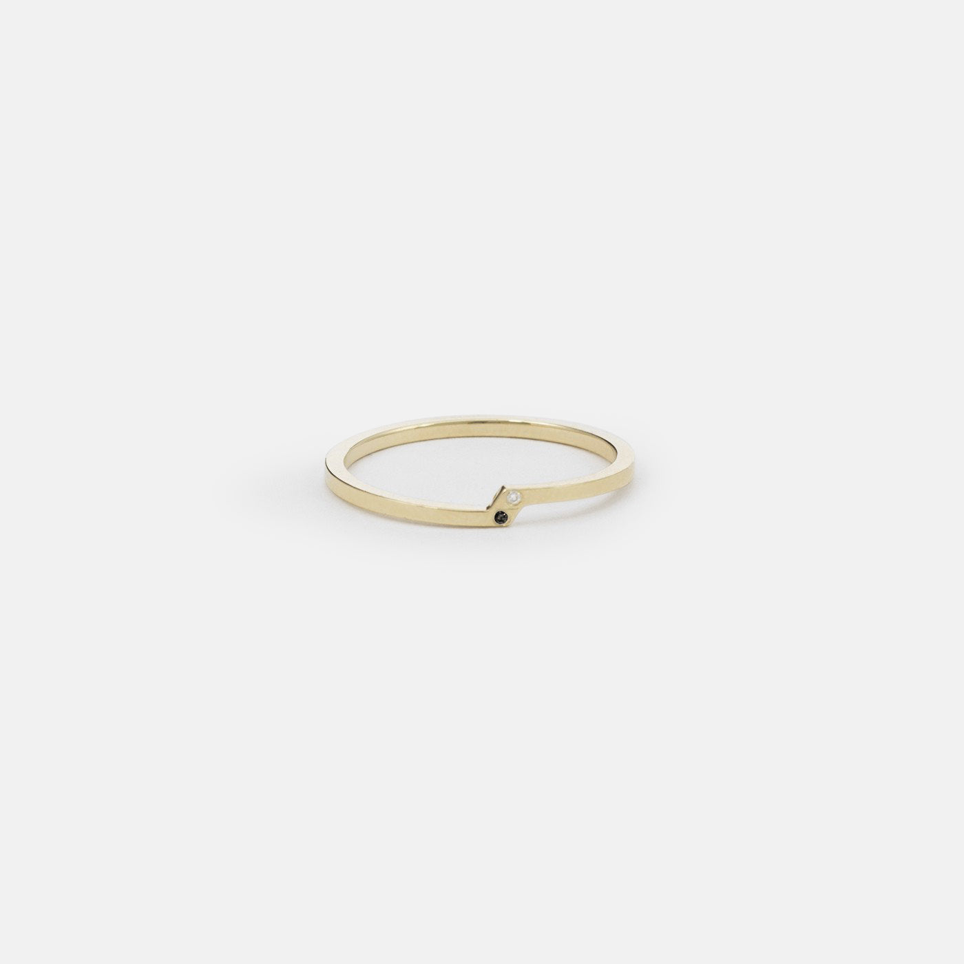 14k yellow gold thin double band ring with one white and one black diamond