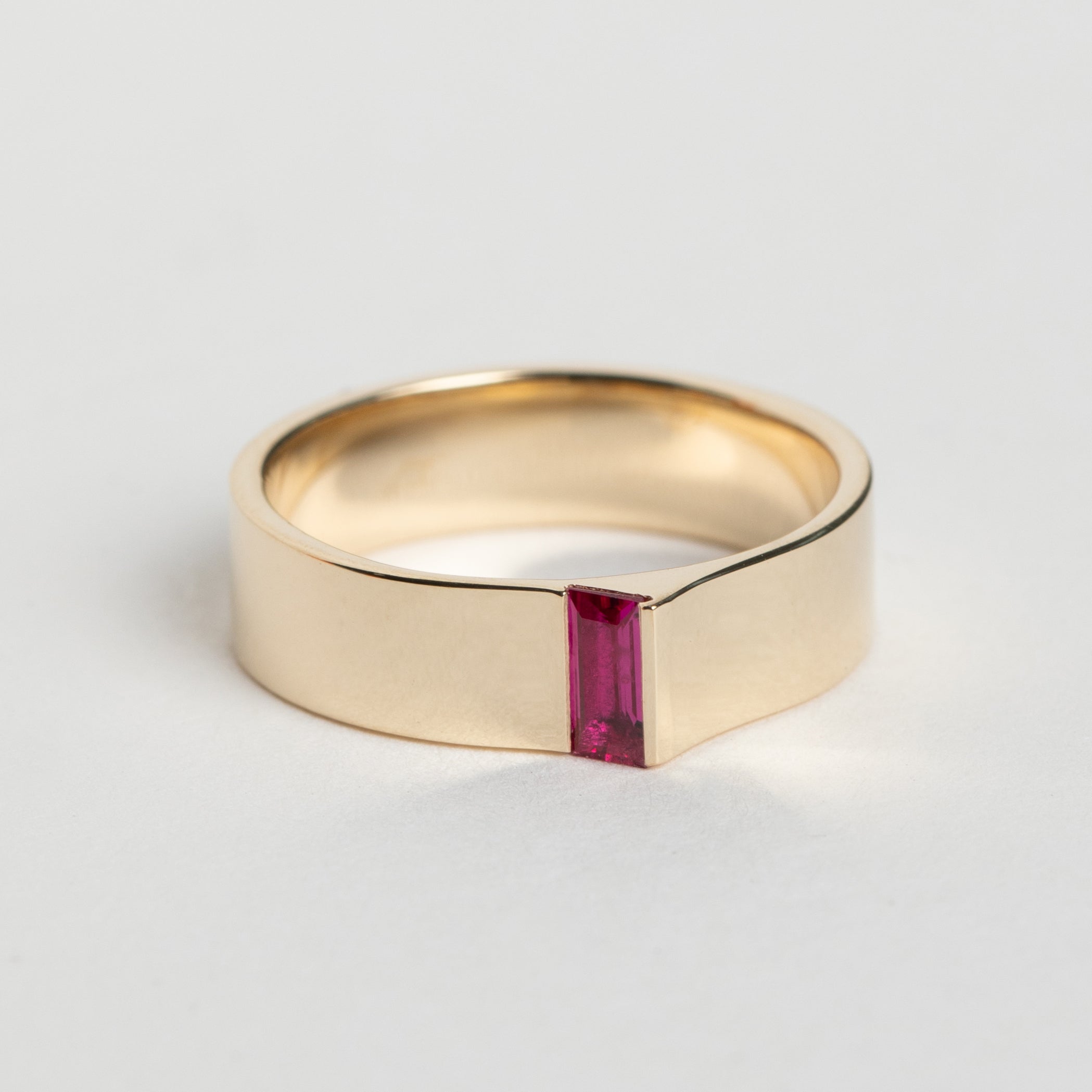 Ethical Braga Ring in 14 karat yellow gold set with a baguette cut precious ruby gemstone by SHW Fine Jewelry made in NYC