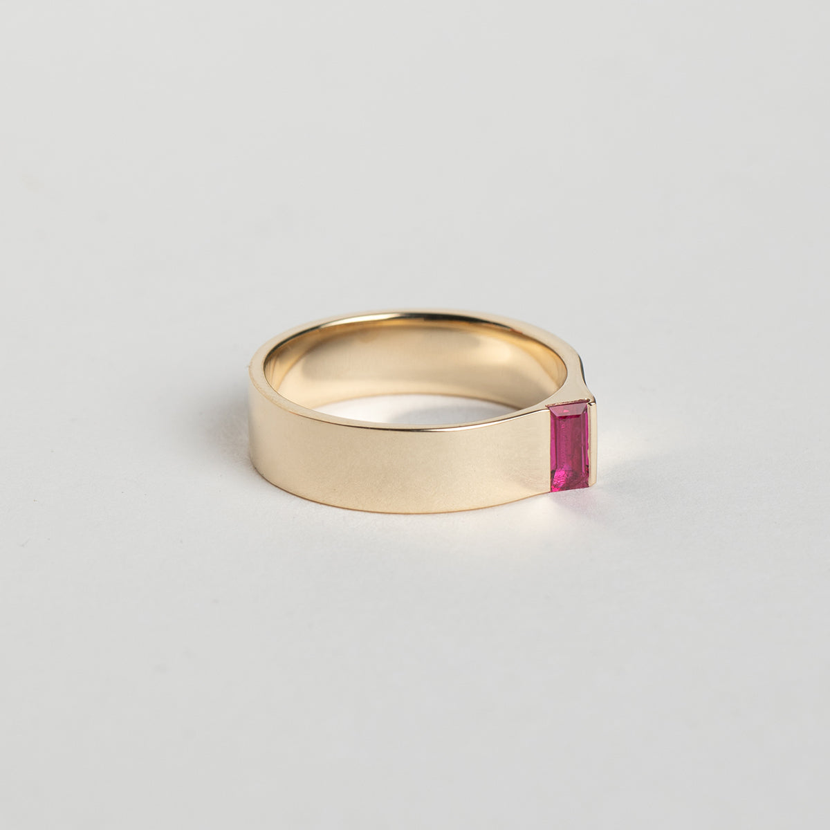 Designer Braga Handmade Ring in 14 karat yellow gold set with a baguette cut precious ruby gemstone by SHW Fine Jewelry made in New York City