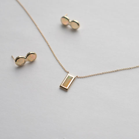 Minimal Alia Necklace in 14k yellow gold set with baguette cut opal made in NYC by SHW fine Jewelry