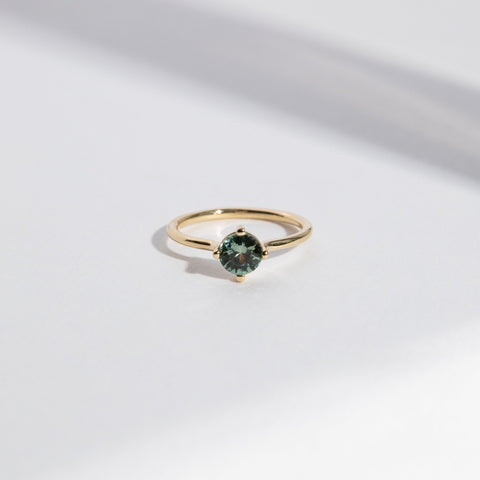 Velu Designer Ring in 14k Gold set with a 0.8ct round brilliant cut green sapphire By SHW Fine Jewelry NYC