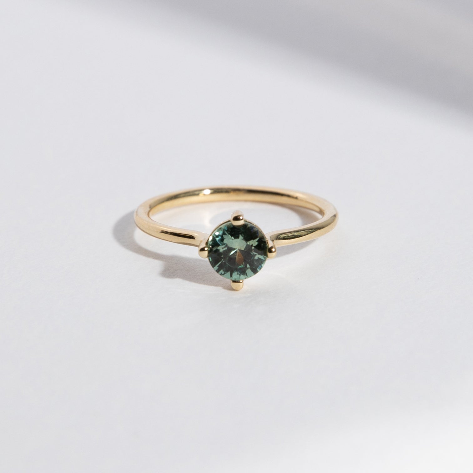 Velu Stacking Ring in 14k Gold set with a 0.8ct round brilliant cut green sapphire By SHW Fine Jewelry NYC