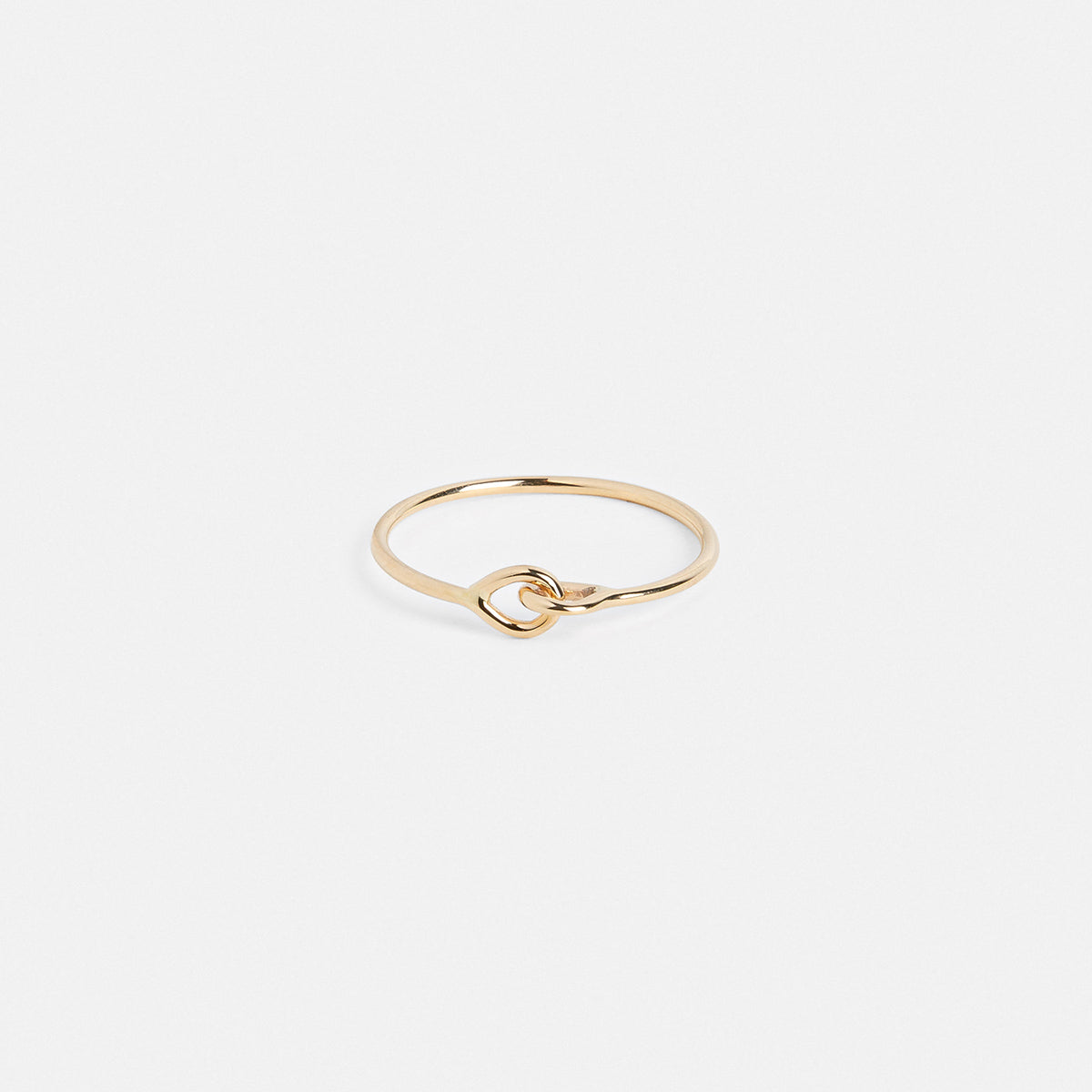 14k yellow gold thin round profile ring with connecting design